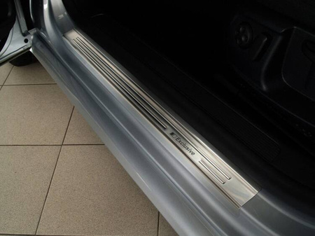 Zestaw (Nakładka na zderzak tylny + nakładki progowe) do Volkswagen Passat B7 Kombi