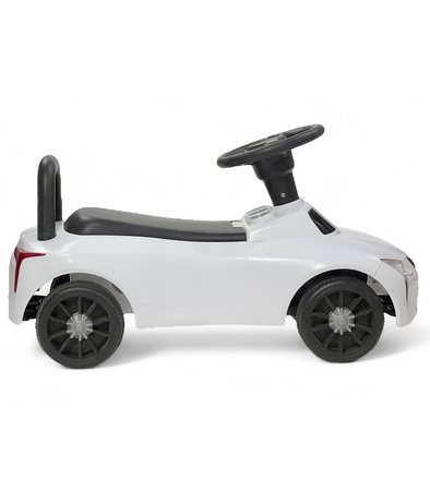JEŹDZIK PCHACZ POJAZD BIAŁY PODNÓŻEK PEDAŁ GAZU DŹWIĘKI UCHWYT NA BATERIE DO ZABAWY JAZDY DLA DZIECI